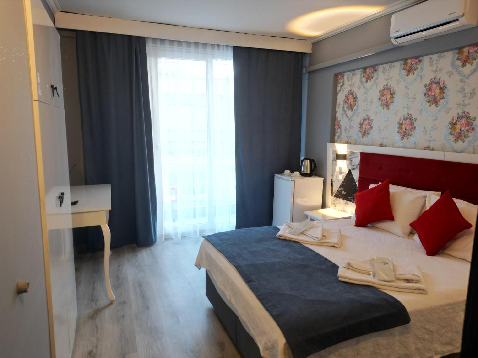 Akman City Hotel คูซาดาซี ภายนอก รูปภาพ