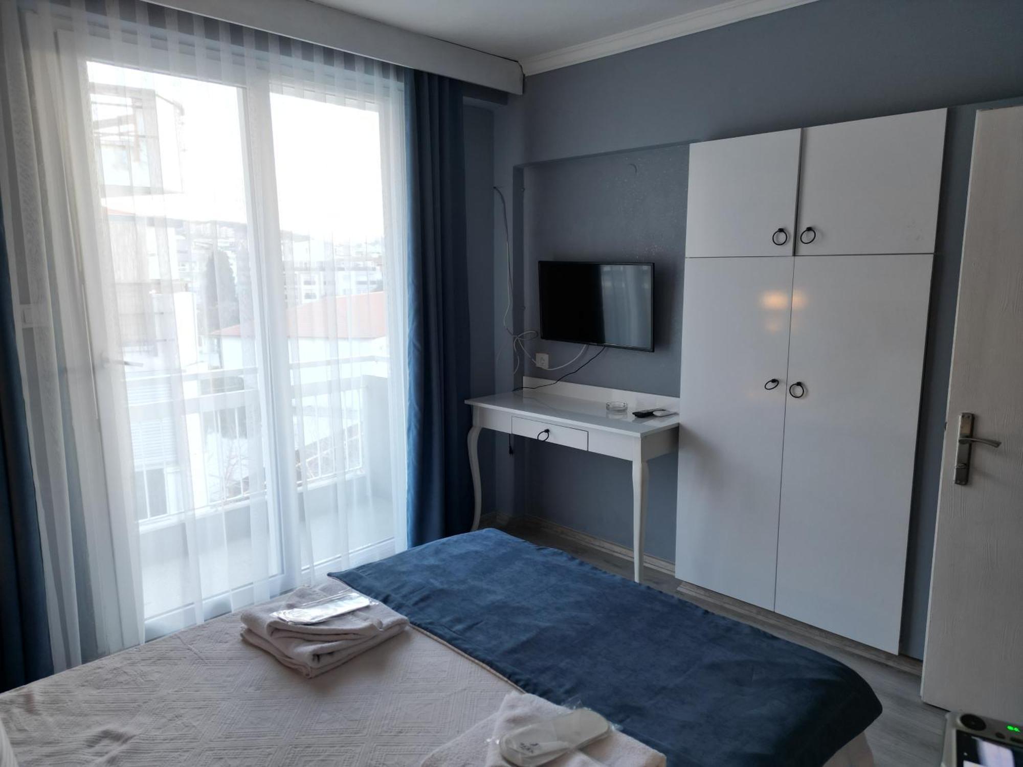 Akman City Hotel คูซาดาซี ภายนอก รูปภาพ