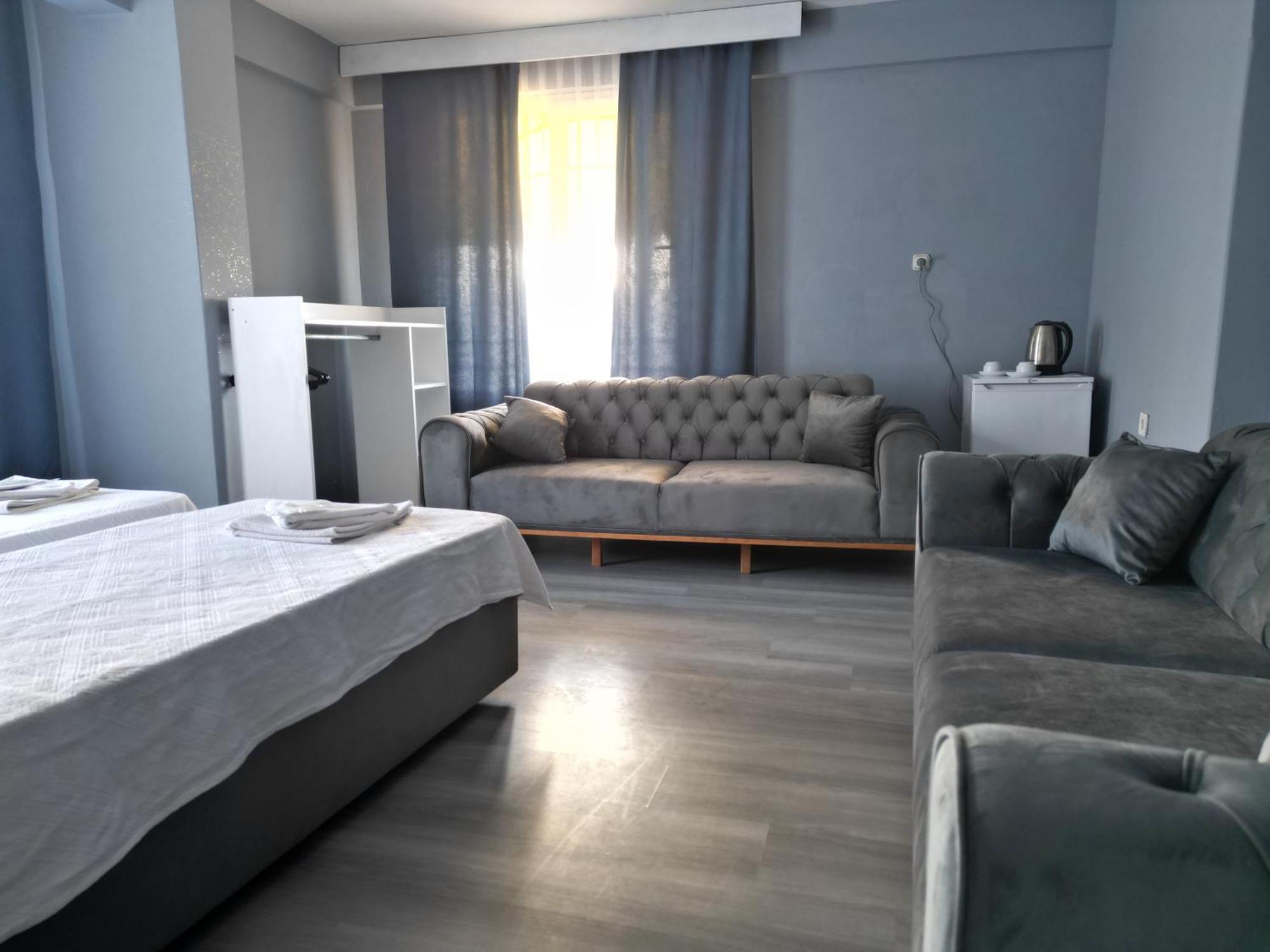 Akman City Hotel คูซาดาซี ภายนอก รูปภาพ