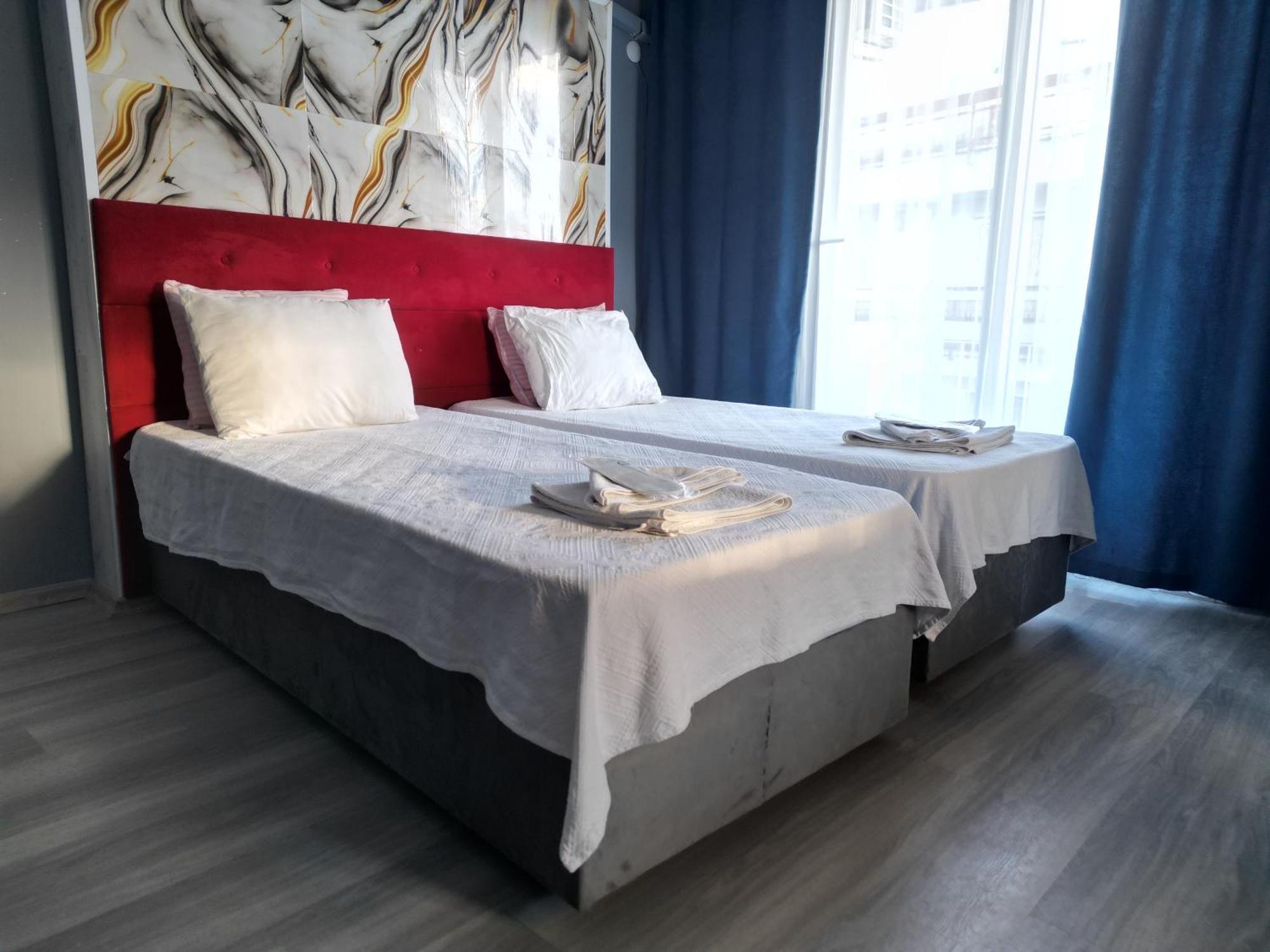 Akman City Hotel คูซาดาซี ภายนอก รูปภาพ