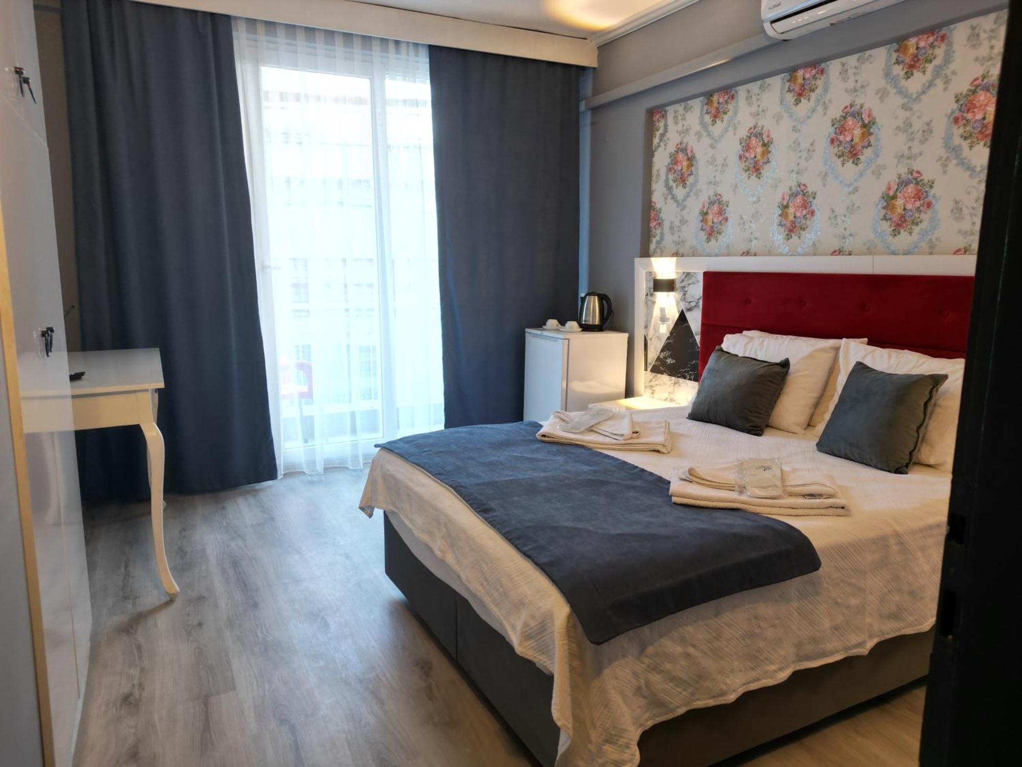 Akman City Hotel คูซาดาซี ภายนอก รูปภาพ