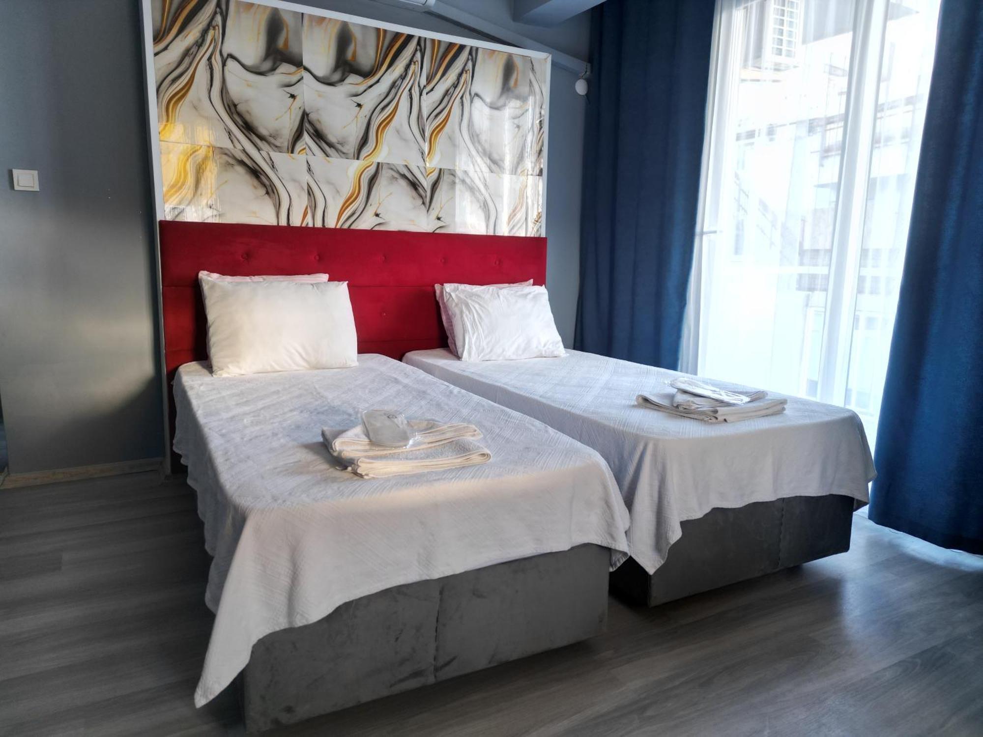 Akman City Hotel คูซาดาซี ภายนอก รูปภาพ