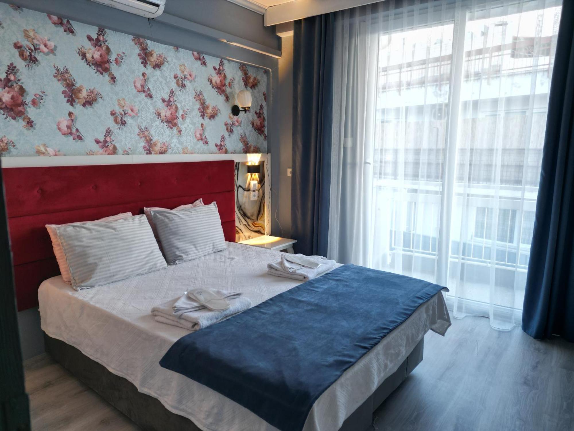 Akman City Hotel คูซาดาซี ภายนอก รูปภาพ