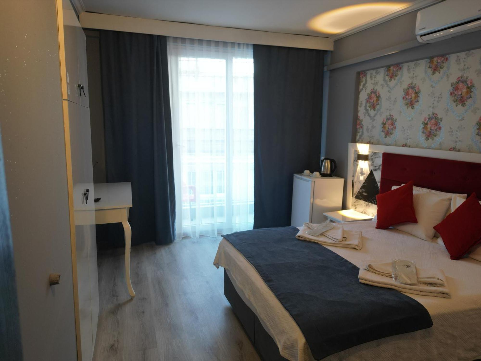 Akman City Hotel คูซาดาซี ภายนอก รูปภาพ