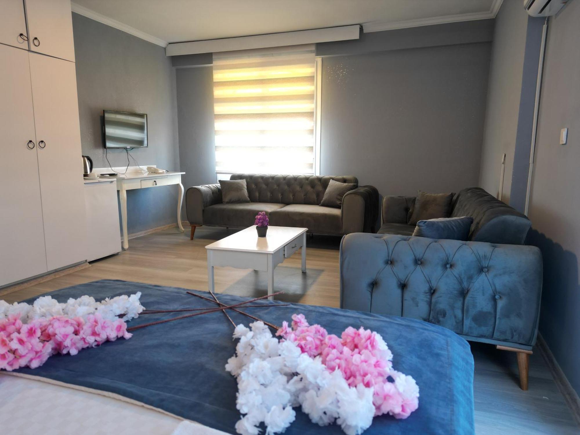 Akman City Hotel คูซาดาซี ภายนอก รูปภาพ