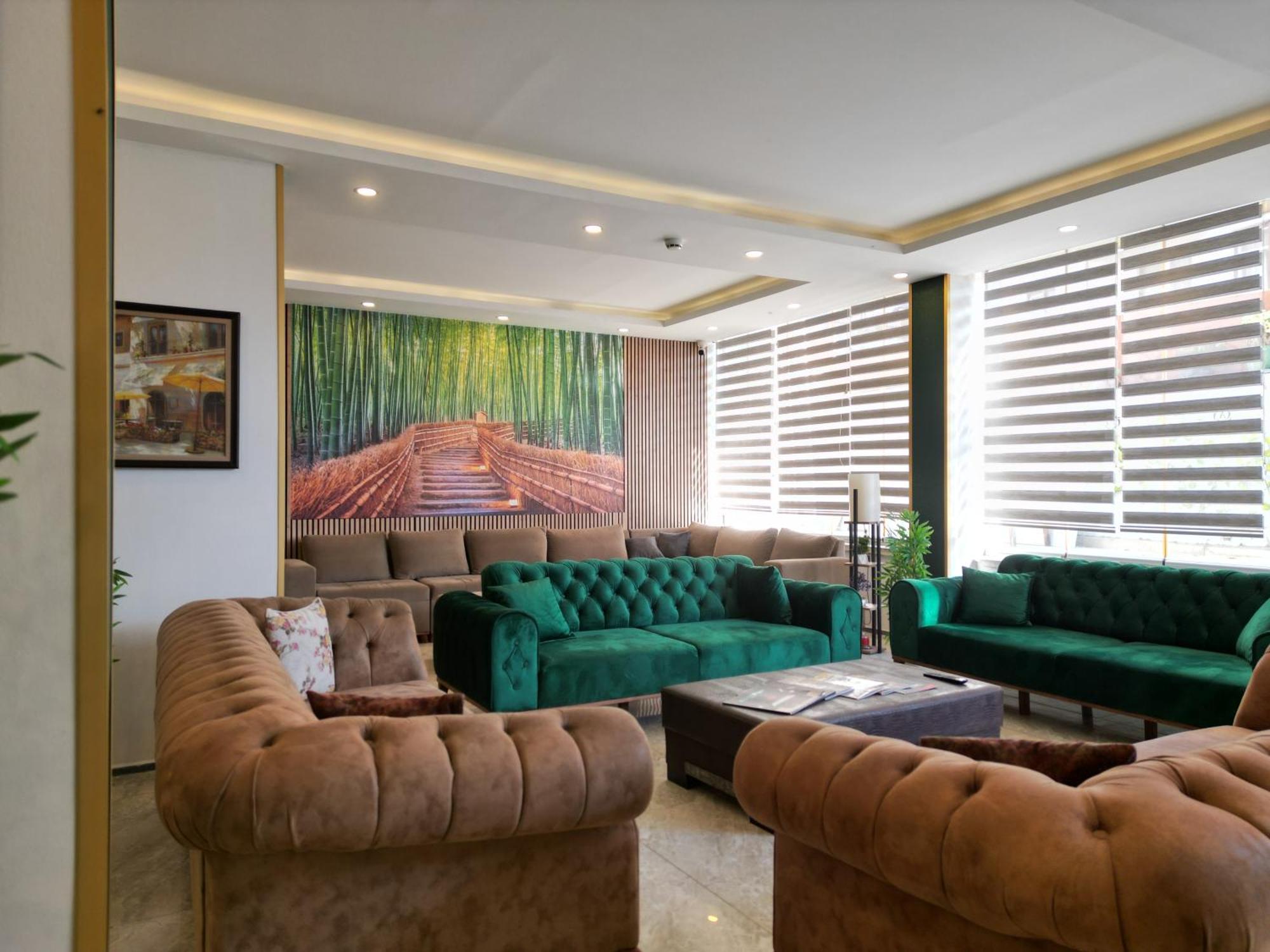 Akman City Hotel คูซาดาซี ภายนอก รูปภาพ