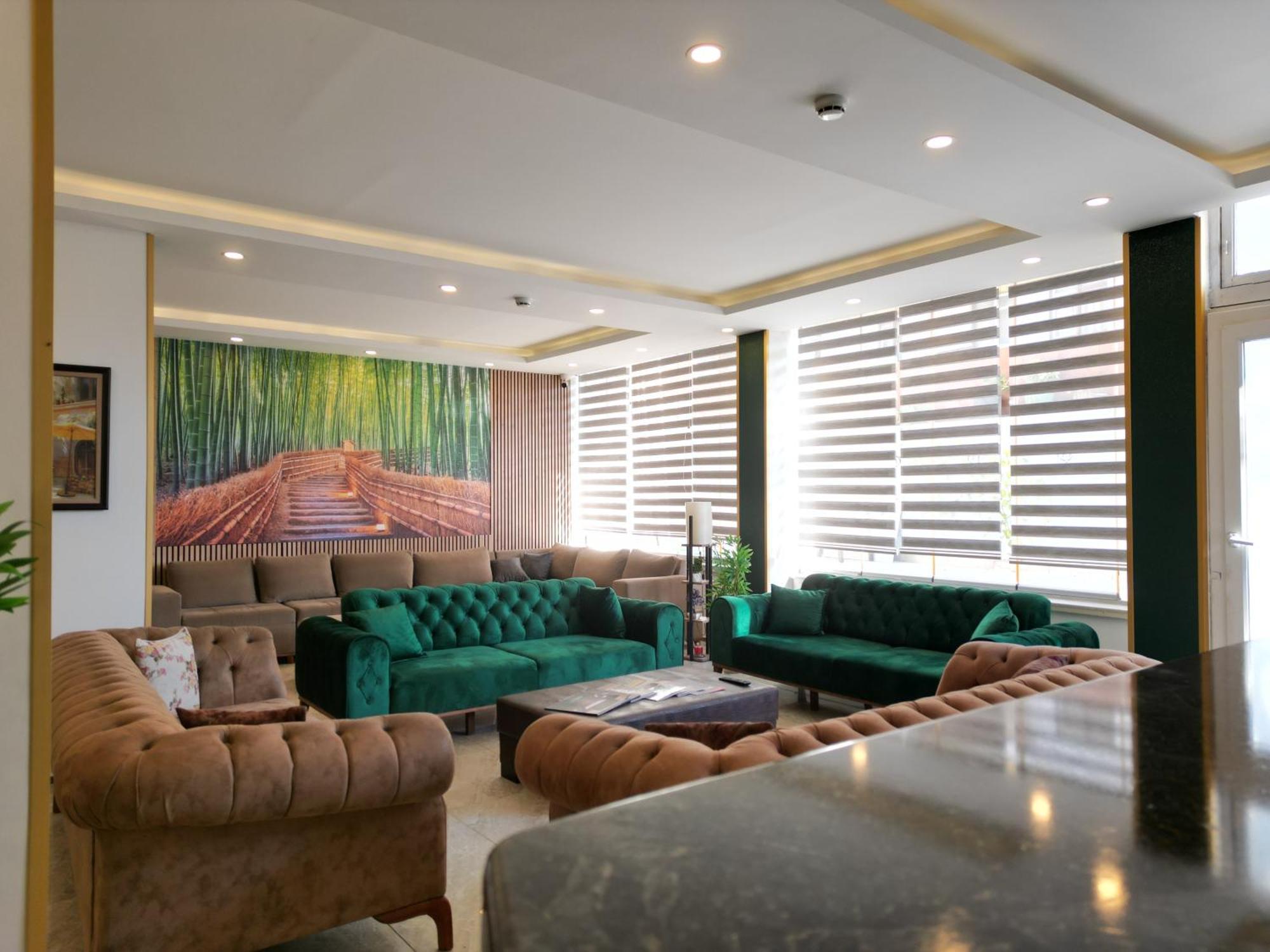 Akman City Hotel คูซาดาซี ภายนอก รูปภาพ